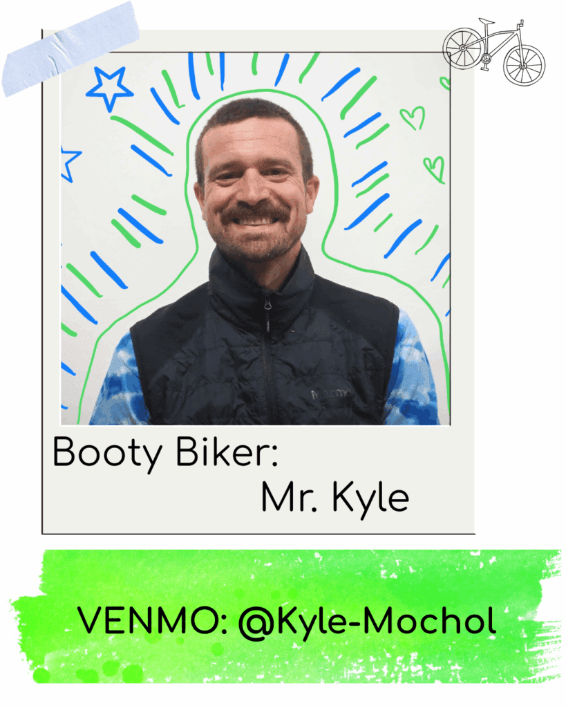 Smiling biker surrounded by colorful doodles.